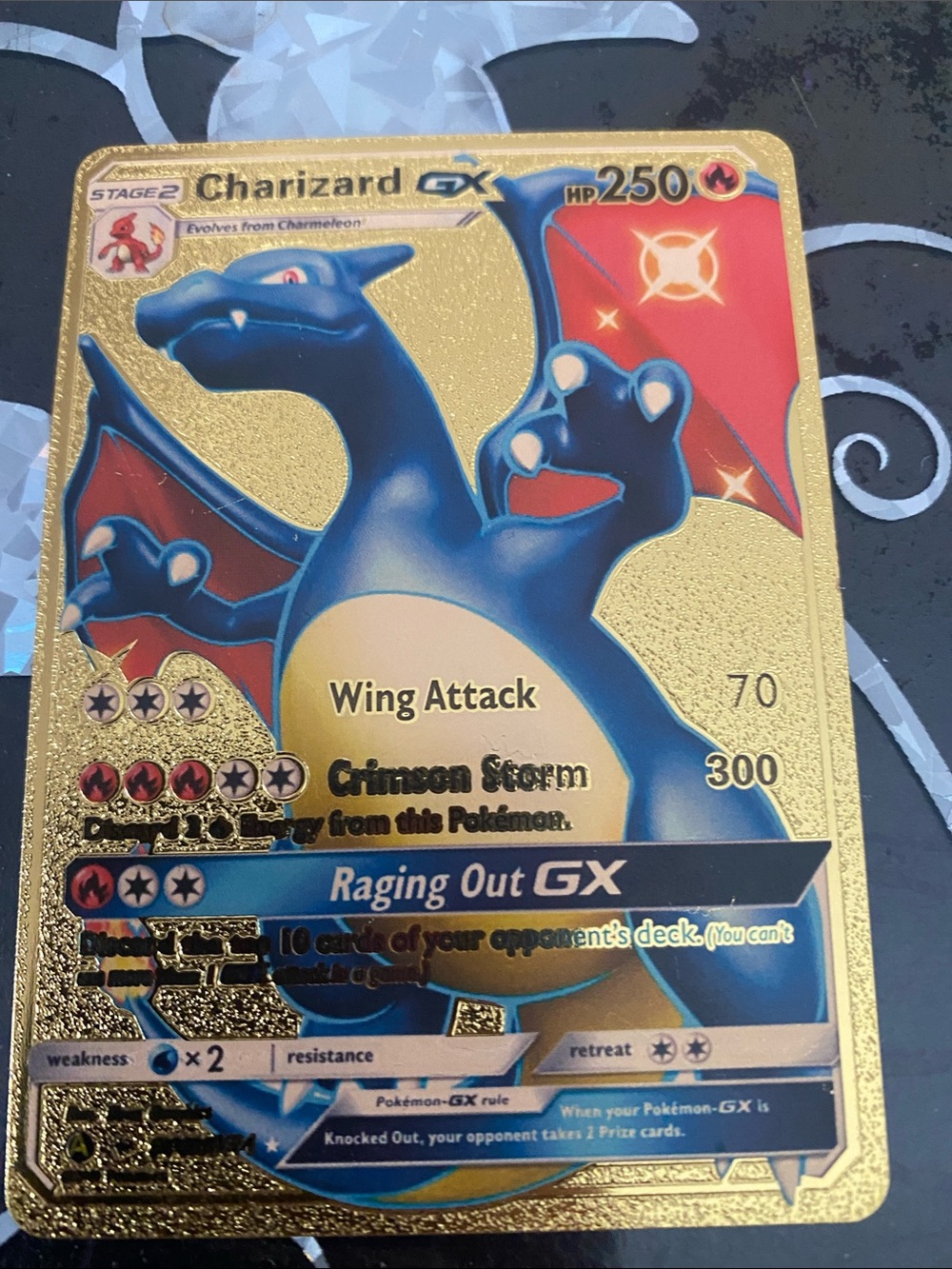 Charizard GX Gold Holo Trading Card - Blue & Red